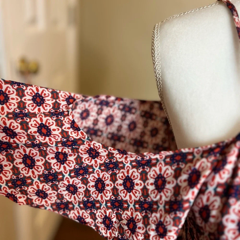 Intu  cold shoulder dress with rust navy blue black and white pattern.  Size XS - Picture 5 of 5